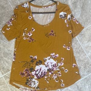 Medium mustard colored shirt